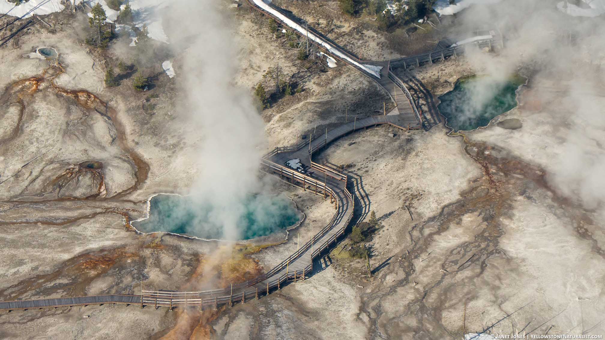 aerial view of Black Pool and Abyss Pool at West Thumb Geyser Basin